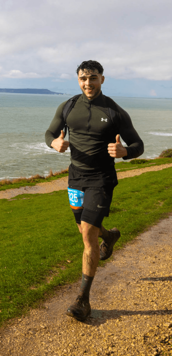 Arun trail running along the South Coast