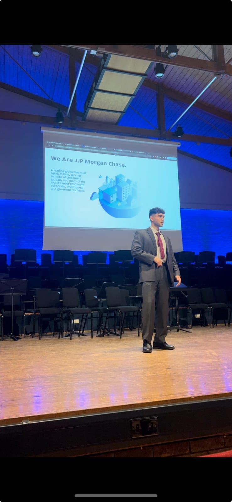 Arun McGoay speaking on stage